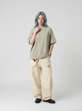DAXUEN Men's short-sleeved oversized T-shirt with contrast panels — model photo