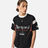 DAXUEN Relaxed oversized quarter-zip graphic t-shirt — model photo
