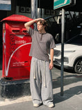 DAXUEN Relaxed-fit striped Henley T-shirt — model photo