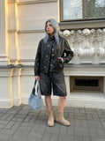DAXUEN Relaxed wide-leg denim shorts — model photo
