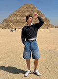 DAXUEN Relaxed wide-leg denim shorts — model photo