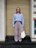 DAXUEN Relaxed wide-leg pants with color blocking — model photo