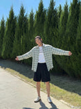 DAXUEN Wide-leg relaxed-fit shorts in dark grey and black — model photo