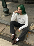 DAXUEN Long sleeve crew neck t-shirt with text graphic — model photo