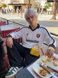 DAXUEN Long sleeve T-shirt styled like a football jersey — model photo