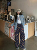 DAXUEN Women's wide leg lounge pants with cartoon print — model photo