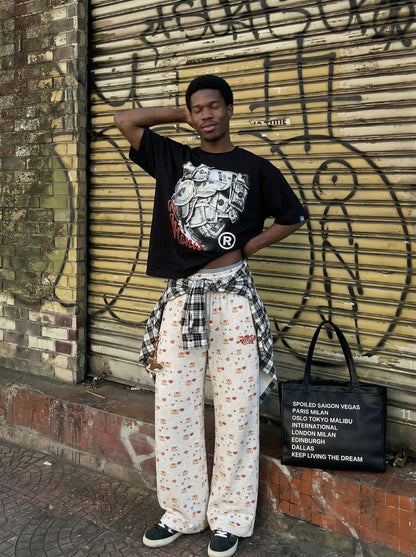 DAXUEN Women's wide leg lounge pants with cartoon print — model photo