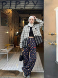 DAXUEN Women's wide leg lounge pants with cartoon print — model photo