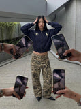 DAXUEN Cropped hooded sweatshirt with graphics — model photo