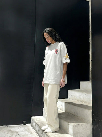 DAXUEN Oversized short-sleeved embroidered T-shirt — model photo