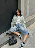 DAXUEN Pair of high-waisted, wide-leg denim culotte shorts — model photo