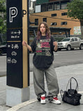DAXUEN Retro graphic oversized T-shirt with multi-layered print — model photo