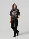 DAXUEN Retro graphic oversized T-shirt with multi-layered print — model photo