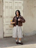 DAXUEN Pair of light grey relaxed-fit herringbone cargo shorts — model photo
