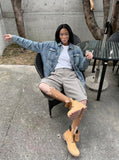 DAXUEN Pair of light grey relaxed-fit herringbone cargo shorts — model photo