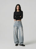 DAXUEN Light blue high-waisted wide-leg denim jeans — model photo