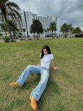 DAXUEN Light blue high-waisted wide-leg denim jeans — model photo