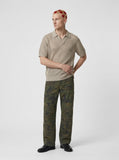 DAXUEN Men's short-sleeved knitted polo shirt — model photo
