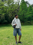 DAXUEN Men's loose-fit wide-leg denim shorts — model photo