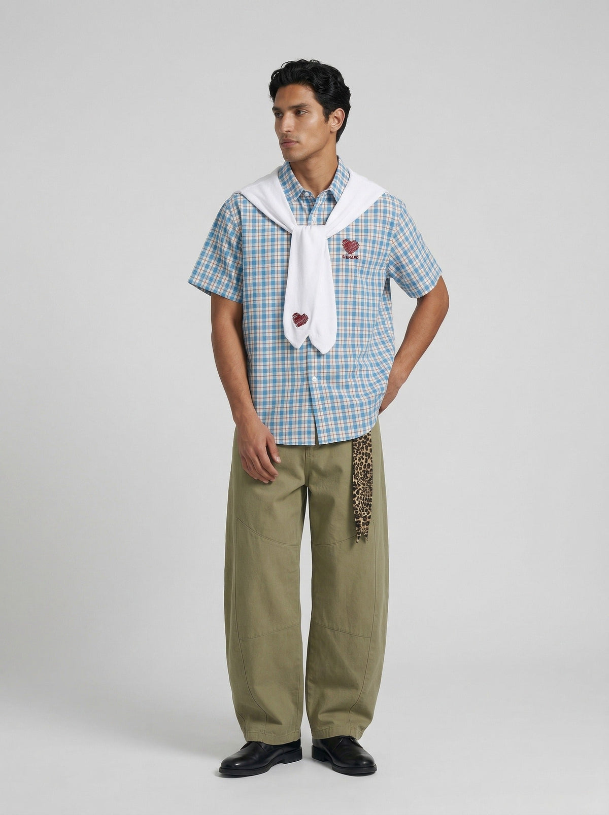 DAXUEN Checkered short-sleeved button-up shirt with embroidered details — model photo