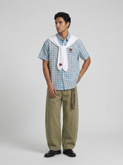 DAXUEN Checkered short-sleeved button-up shirt with embroidered details — model photo