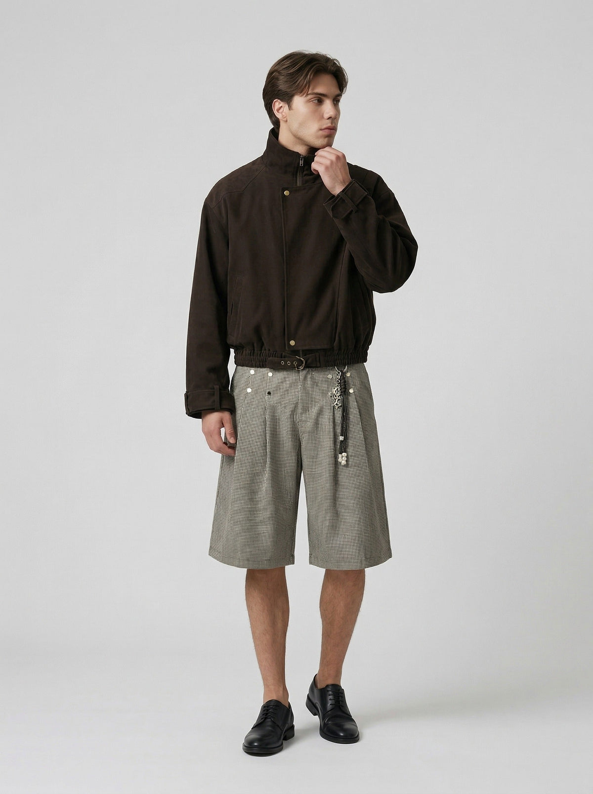 DAXUEN High-waisted wide-leg culotte shorts with micro-check pattern — model photo