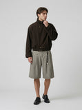 DAXUEN High-waisted wide-leg culotte shorts with micro-check pattern — model photo