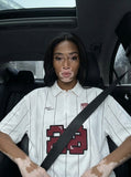 DAXUEN White short-sleeved polo shirt with pinstripes and graphics — model photo