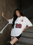 DAXUEN White short-sleeved polo shirt with pinstripes and graphics — model photo