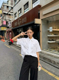 DAXUEN Retro puppy print button-up shirt with faux tie detail — model photo
