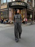 DAXUEN Grey long-sleeve knitted cardigan with star graphic — model photo