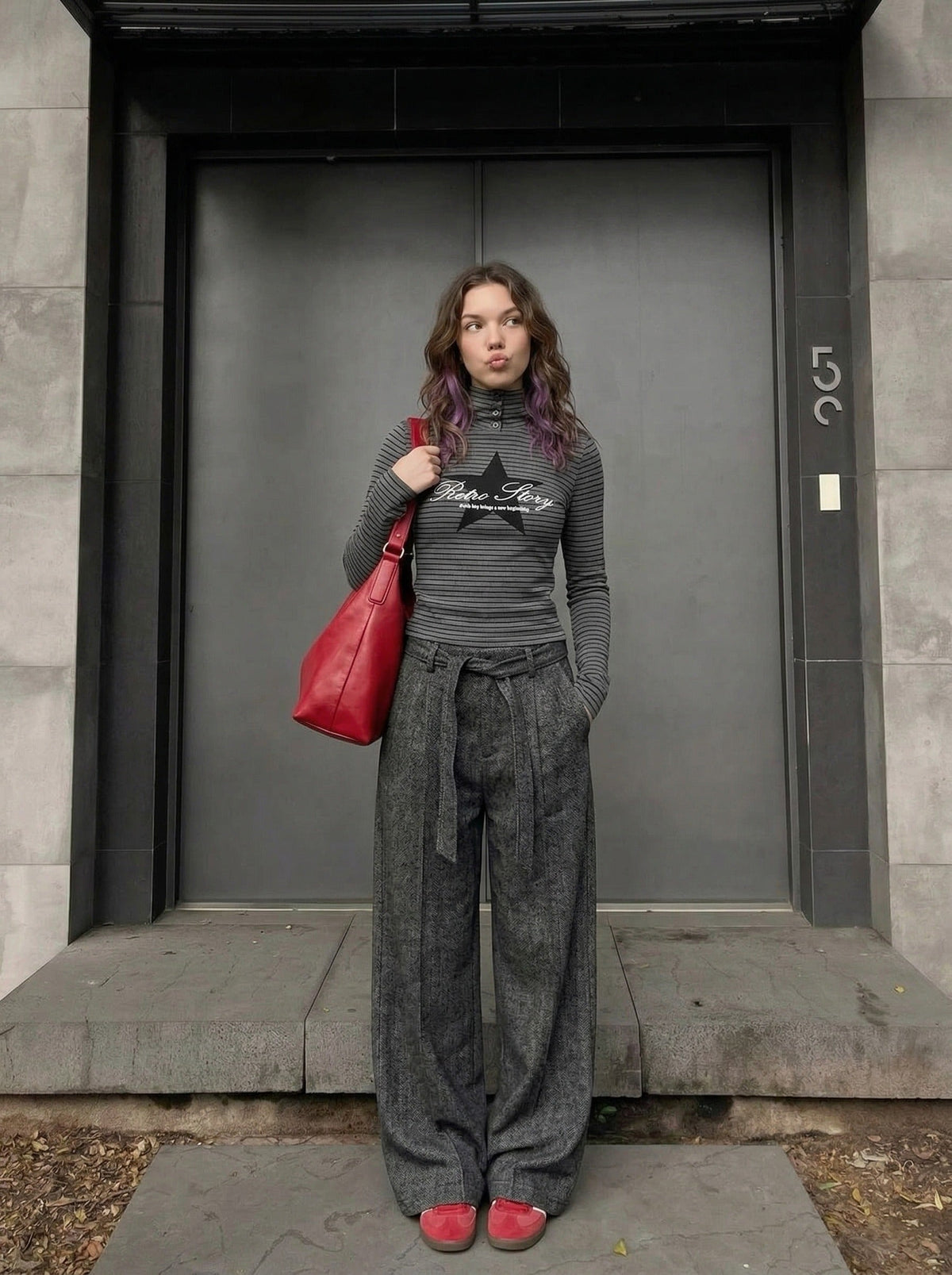 DAXUEN Grey long-sleeve knitted cardigan with star graphic — model photo