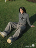 DAXUEN Fitted long-sleeved turtleneck top with star graphic — model photo