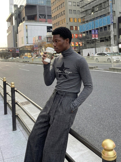 DAXUEN Fitted long-sleeved turtleneck top with star graphic — model photo