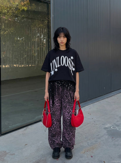 DAXUEN Graphic T-Shirt with retro street style design — model photo