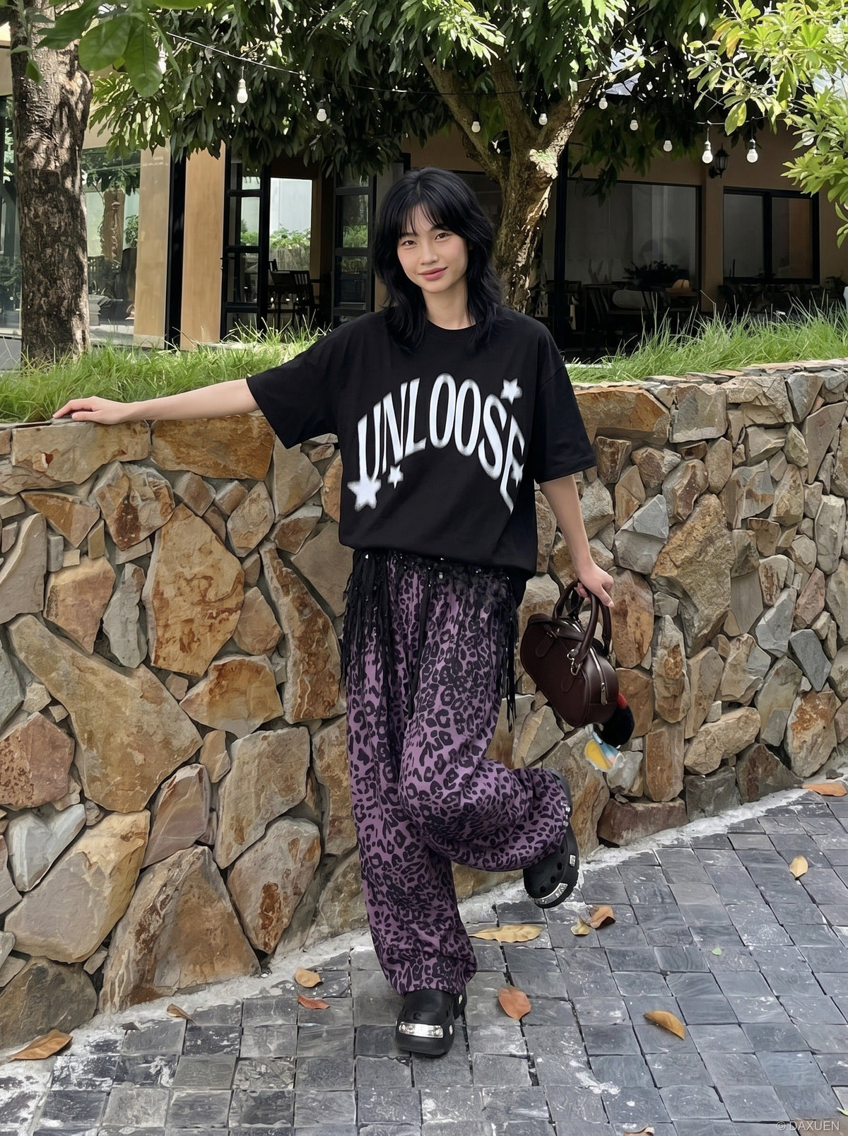 DAXUEN Graphic T-Shirt with retro street style design — model photo
