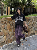DAXUEN Graphic T-Shirt with retro street style design — model photo