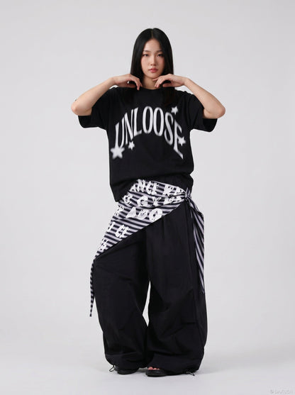 DAXUEN Graphic T-Shirt with retro street style design — model photo