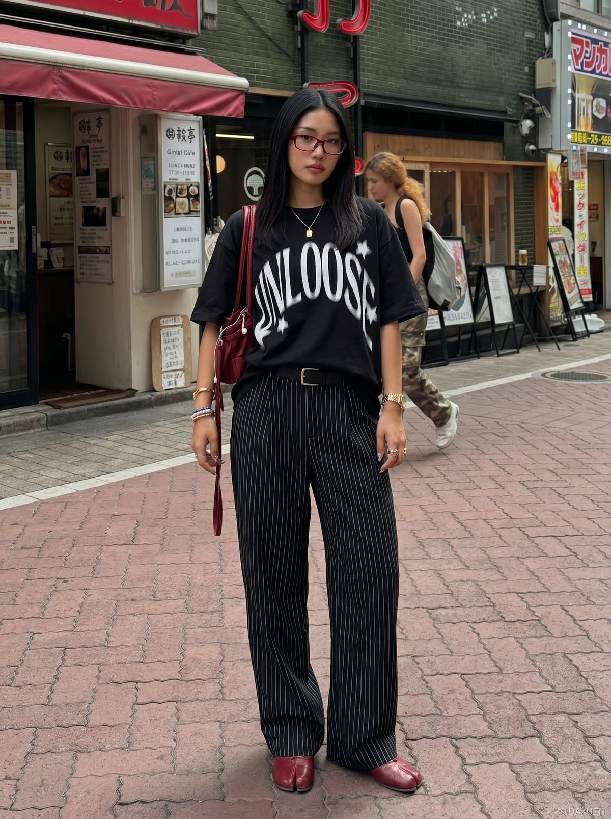 DAXUEN Graphic T-Shirt with retro street style design — model photo