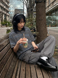 DAXUEN Loose-fitting striped Henley T-shirt — model photo
