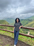 DAXUEN Loose-fitting striped Henley T-shirt — model photo
