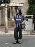 DAXUEN Oversized striped graphic T-shirt — model photo