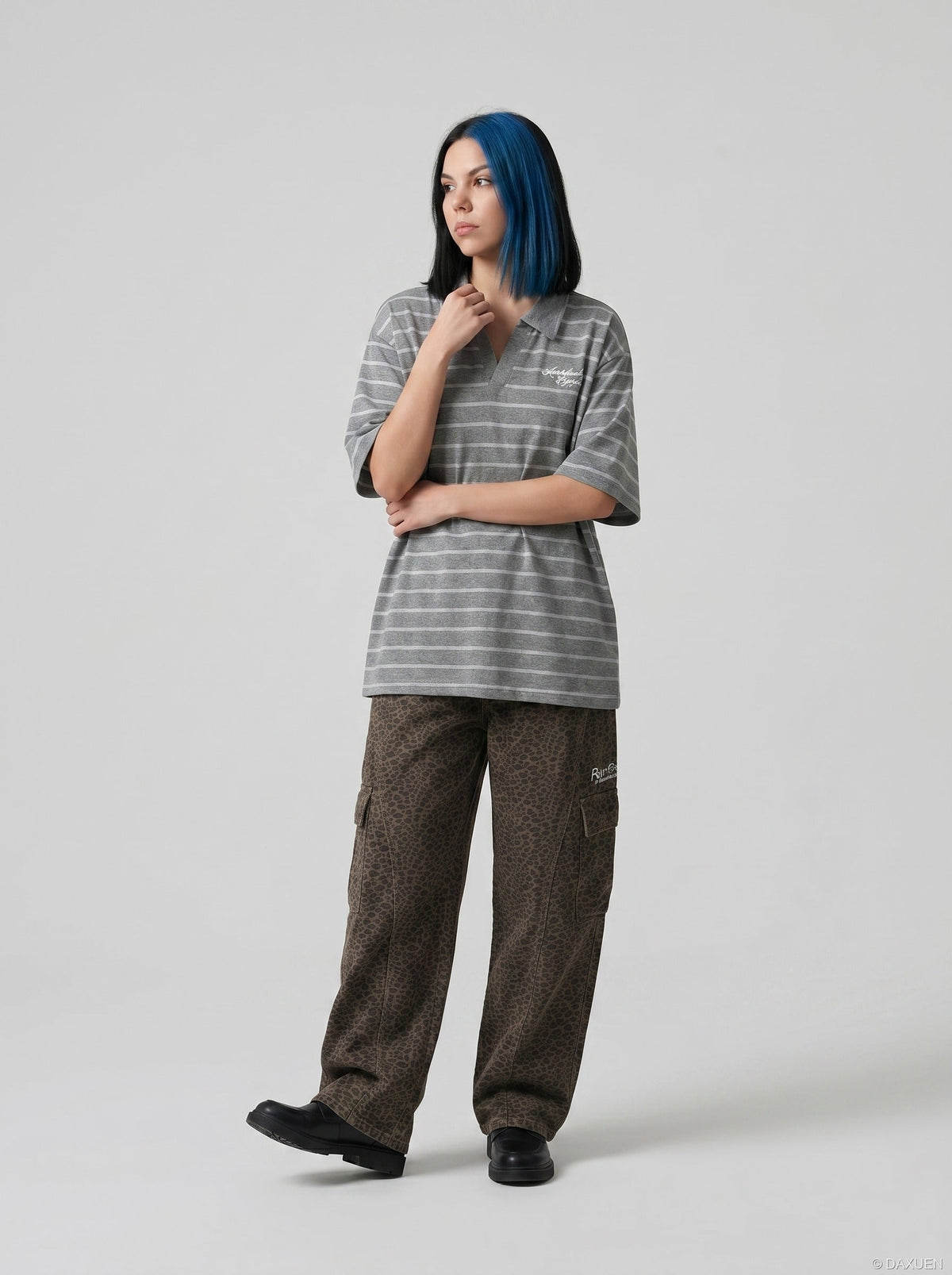 DAXUEN Relaxed-fit short-sleeved striped polo shirt — model photo
