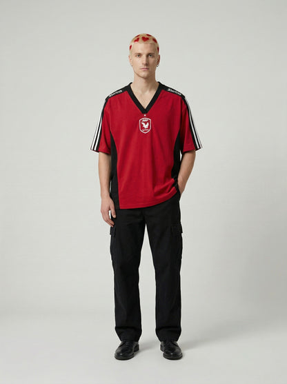 DAXUEN Oversized V-neck T-shirt with contrasting panels and graphics — model photo