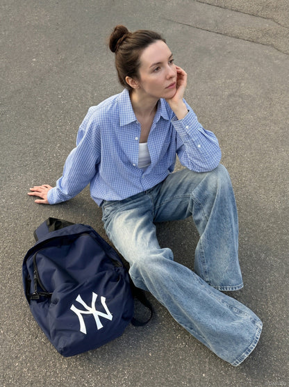 DAXUEN Wide-leg distressed denim jeans in light and dark washes — model photo