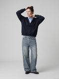 DAXUEN Wide-leg distressed denim jeans in light and dark washes — model photo