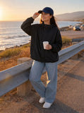 DAXUEN Wide-leg distressed denim jeans in light and dark washes — model photo