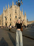 DAXUEN Wide-leg jeans in light faded blue wash — model photo