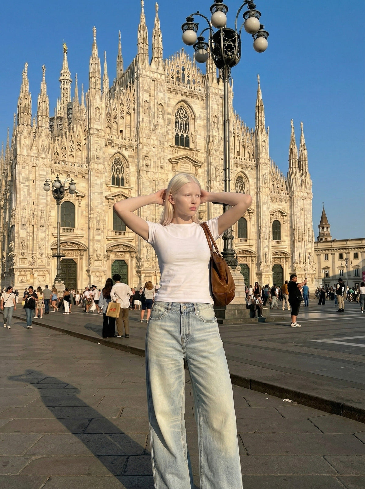 DAXUEN Wide-leg jeans in light faded blue wash — model photo