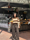 DAXUEN High-waisted wide-leg palazzo pants with pinstripes — model photo